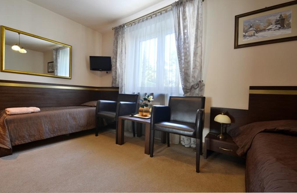 Hotel Orlik Krynica Cameră foto